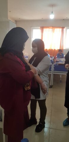 تزریق واکسن آنفولانزا- بهزیستی شهرستان پاکدشت