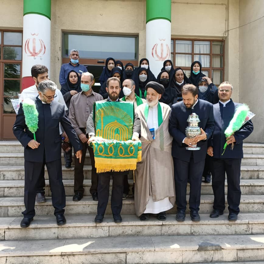 شهر تهران| پرچم حرم رضوی در ستاد بهزیستی گردانده شد