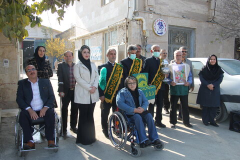 گزارش تصویری ا ورود پرچم حرم مطهر امام رضا علیه السلام در جامعه معلولین جسمی حرکتی استان مرکزی