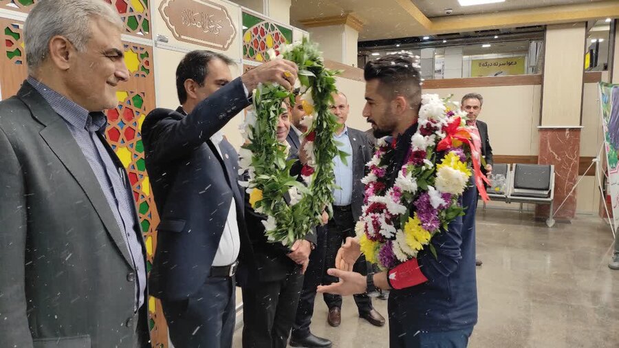 استقبال از ملی‌پوش بوشهری  بازی‌های پاراآسیایی هانگژه چین در فرودگاه بین المللی بوشهر