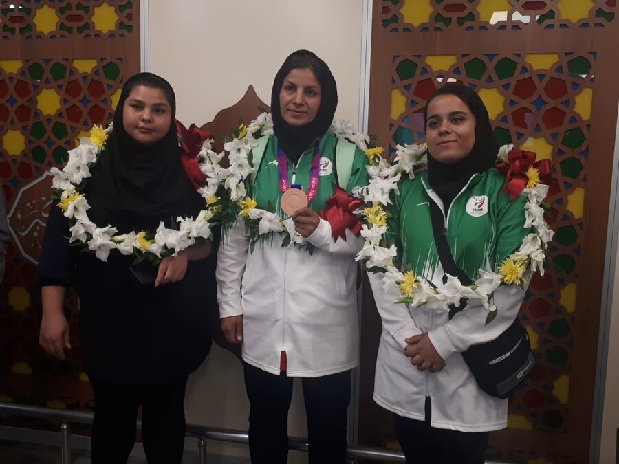 مراسم استقبال از بانوی ورزشکار پاراآسیایی در فرودگاه بین المللی بوشهر