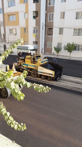 آسفالت خیابان کتاب ۳ محله شرف‌آباد اسلام‌آبادغرب(طرح توانمندسازی محلات کم برخوردار۲۰۲۰)