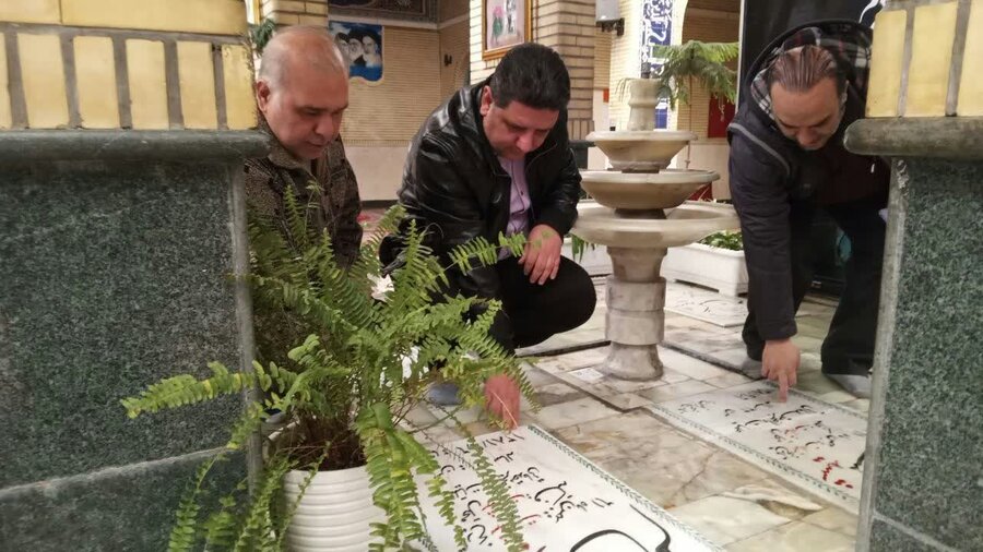 پردیس | غبار روبی و عطر افشانی مزار شهدا به مناسبت ایام مبارک دهه فجر