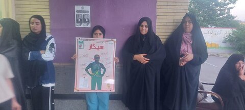 گزارش تصویری| توزیع پوستر هفته مبارزه با مواد مخدر در شعب اخذ رای