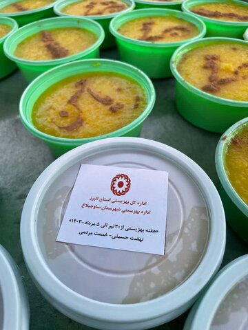 پخت و توزیع شله زرد نذری به مناسبت هفتمین روز شهادت سالار شهیدان