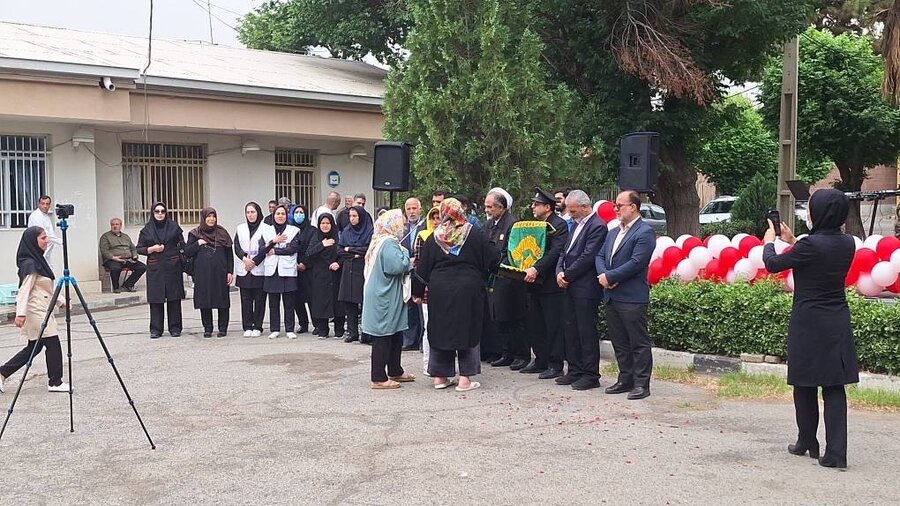 شهر قدس | مراسم پرچم گردانی حرم مطهر امام رضا (ع) در مرکز نگهداری معلولین ذهنی