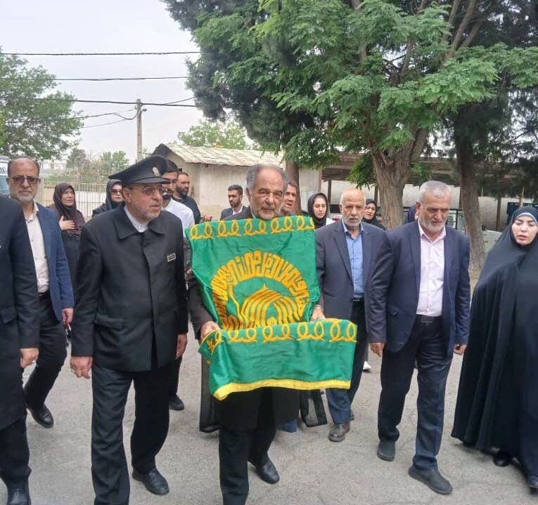 شهر قدس | مراسم پرچم گردانی حرم مطهر امام رضا (ع) در مرکز نگهداری معلولین ذهنی