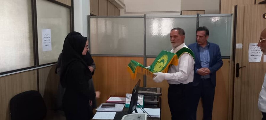 ملارد | پرچم گردانی حرم مطهر امام رضا (ع) در اداره بهزیستی