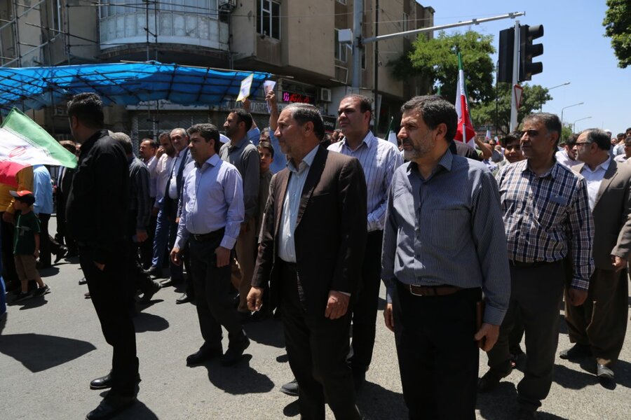 حضور مدیرکل بهزیستی استان و کارکنان در راهپیمایی خشم و نصر در سنندج 