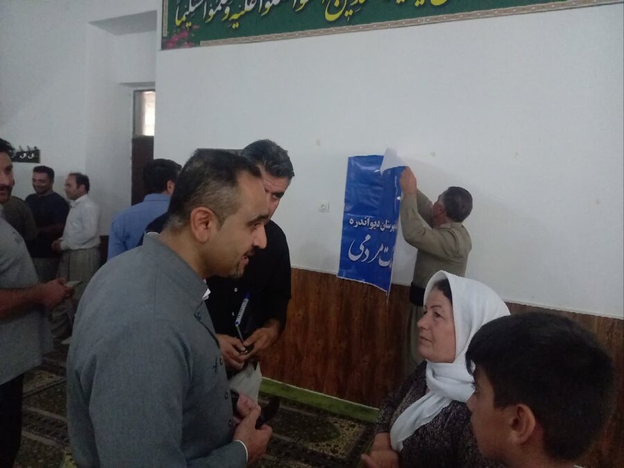 برپایی میز خدمت بهزیستی در مسجد روستای نساره علیا دیواندره
