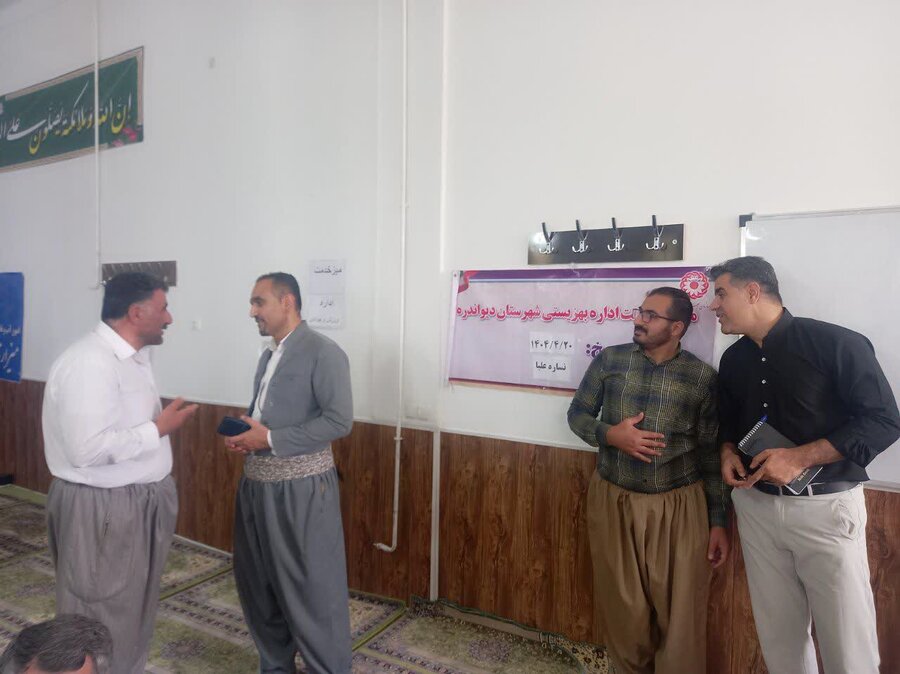 برپایی میز خدمت بهزیستی در مسجد روستای نساره علیا دیواندره
