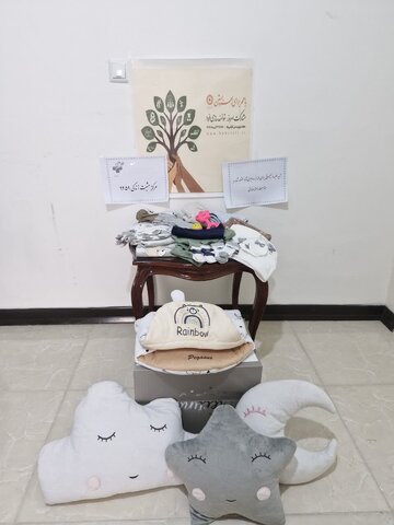 ساوجبلاغ | به مناسبت گرامیداشت هفته بهزیستی / توزیع لباس نوزادی توسط مرکز مثبت زندگی