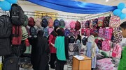 ورامین | برپایی نمایشگاه توزیع لوازم التحریر برای  دانش آموزان تحت پوشش بهزیستی