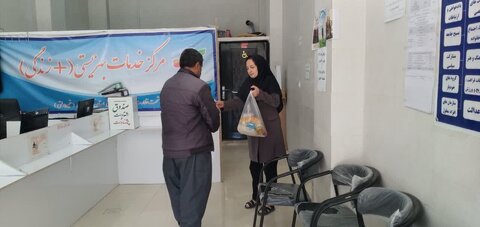 توزیع بسته‌های غذایی و پوشاک میان مددجویان مرکز مثبت زندگی ۵۷۱۶ بیجار