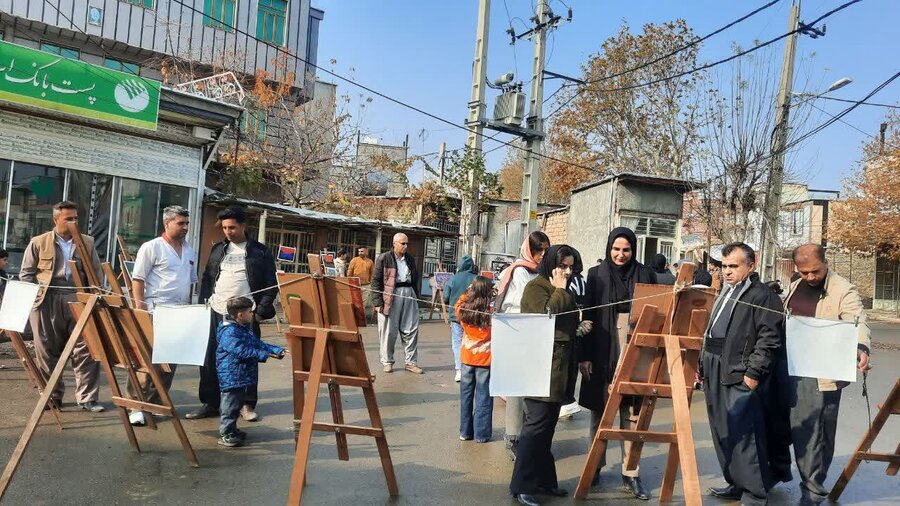 نمایشگاه نقاشی افراد دارای معلولیت در روستای نی مریوان برپا شد 
