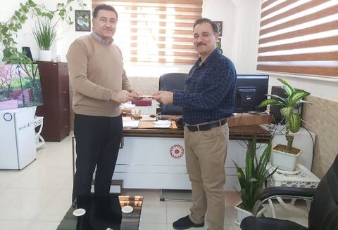 تجلیل از کارمند جانباز اداره بهزیستی بوکان به مناسبت روز جانباز