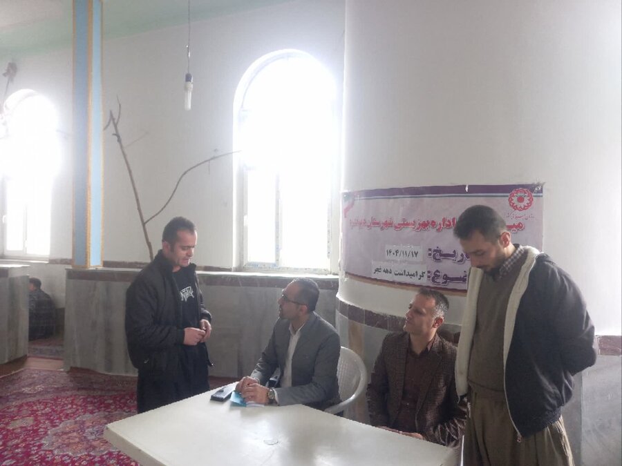 به مناسبت گرامیداشت دهه فجر میز خدمت بهزیستی در شهرستان دیواندره برگزار شد