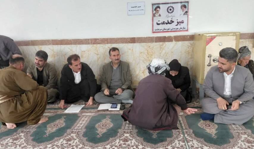 برگزاری میز خدمت به مناسبت ایام الله دهه فجر در مسجد جامع شهر ربط