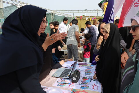 حضور پرشور کارکنان بهزیستی استان بوشهر در راهپیمایی ۲۲ بهمن؛ همگام با مردم و همراه با برپایی میز خدمت