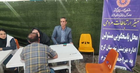 کرج | میز خدمت بهزیستی در مصلّی نماز جمعه محمدشهر برپا شد